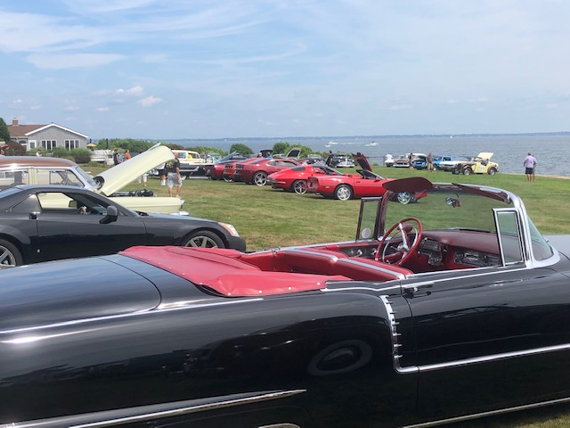 Show cars with Narragansett Bay in the background